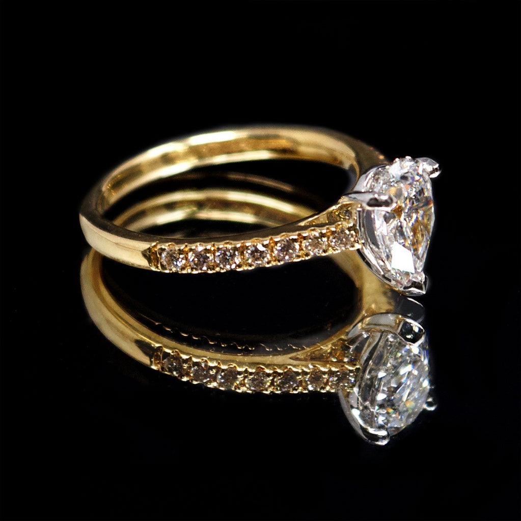 18ct Gold Pear Shaped Halo Diamond Engagement Ring side profile, sold at Nouveau Jewellers in Manchester