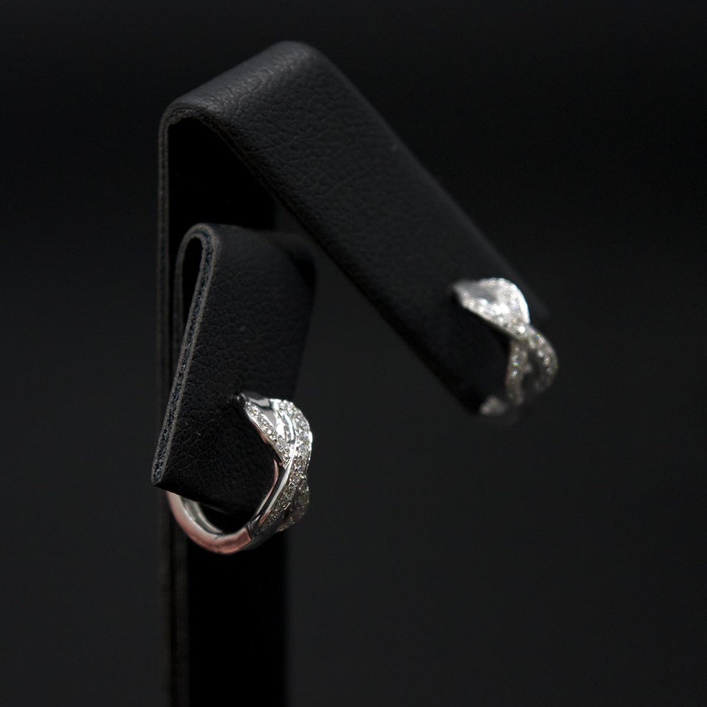 18ct White Gold Infinity Diamond Hoop Earrings different angle, sold at Nouveau Jewellers in Manchester