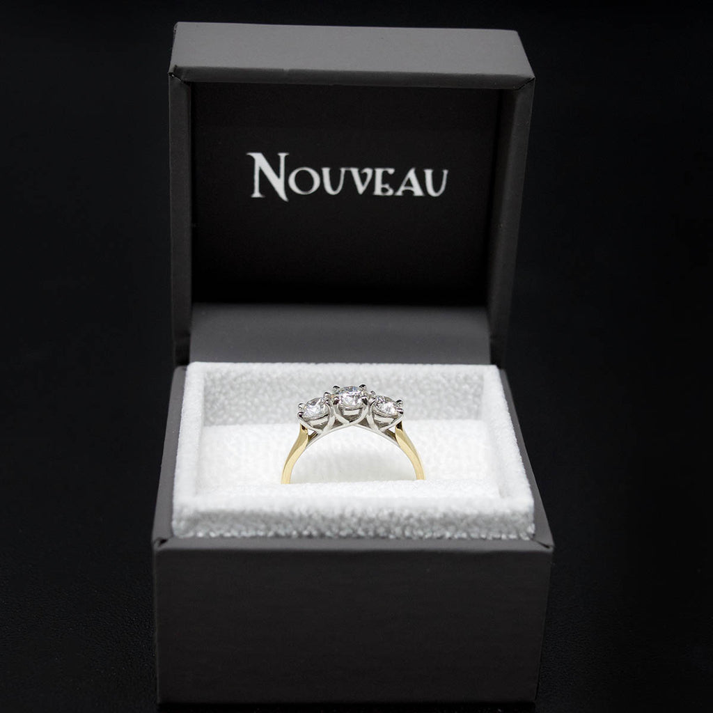 18ct Yellow Gold Trilogy Diamond Engagement Ring in a box, sold at Nouveau Jewellers in Manchester