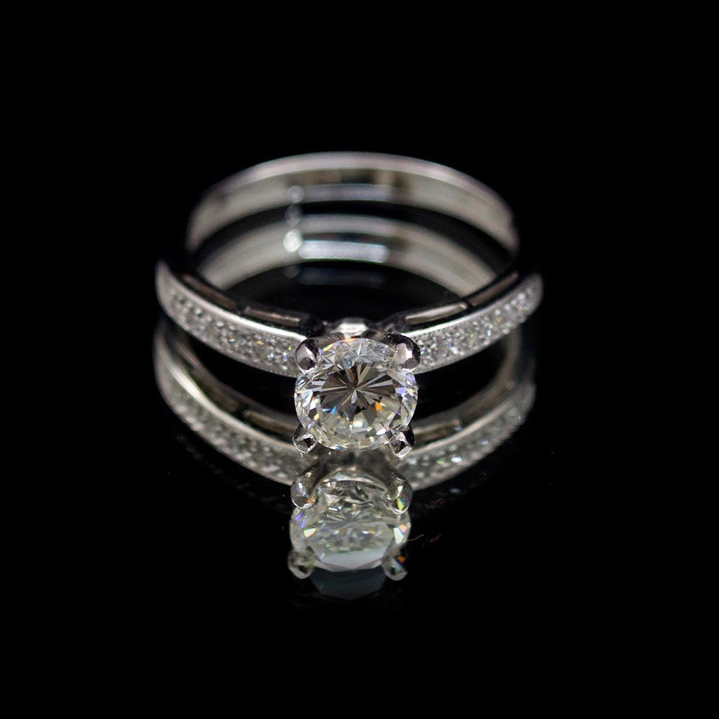 18ct White Gold Solitaire Diamond Engagement Ring with Pavé Shoulders, sold at Nouveau Jewellers in Manchester