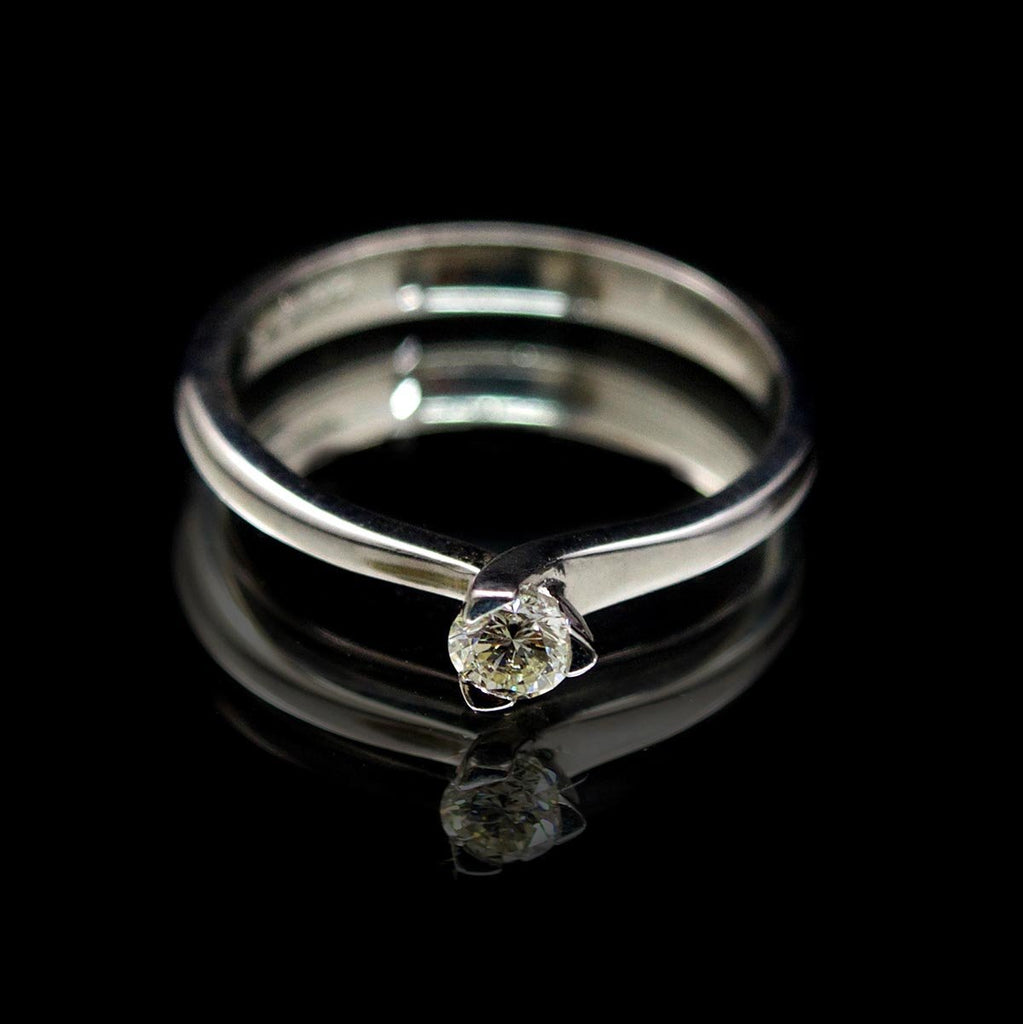 Platinum Twisted Design Solitaire Diamond Engagement Ring, sold at Nouveau Jewellers in Manchester