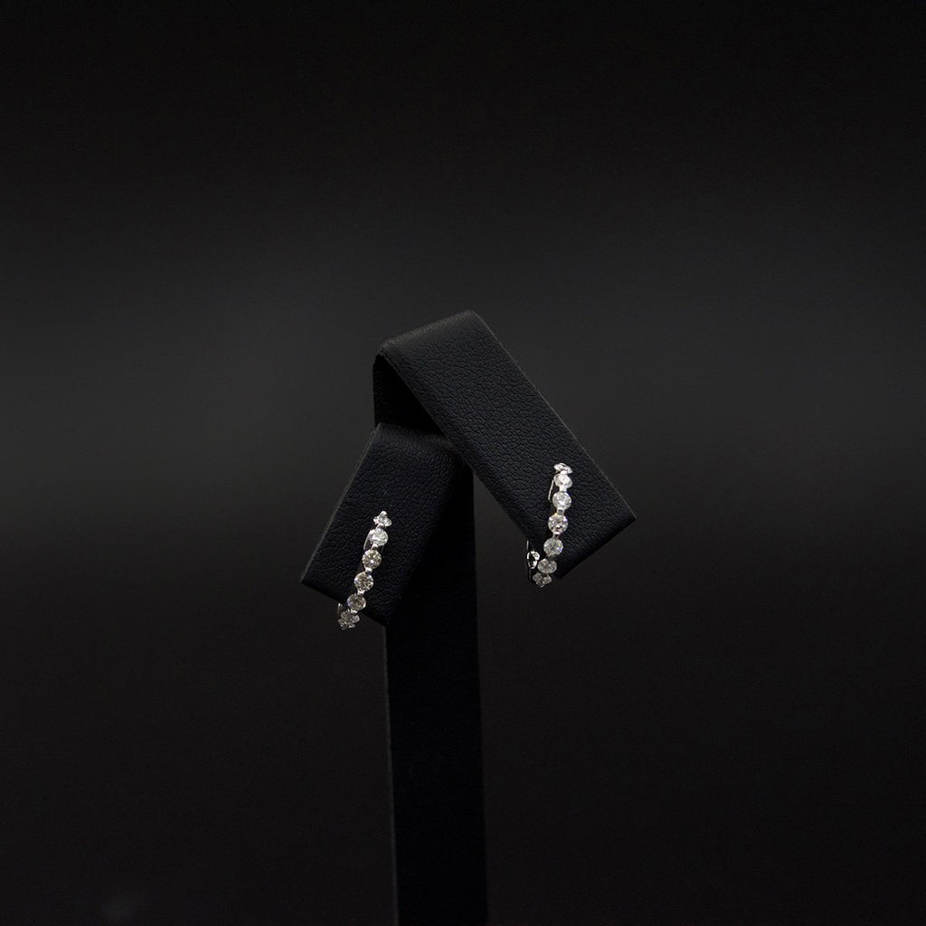18ct White Gold Elegant Diamond Hoop Earrings Close Up, sold at Nouveau Jewellers in Manchester