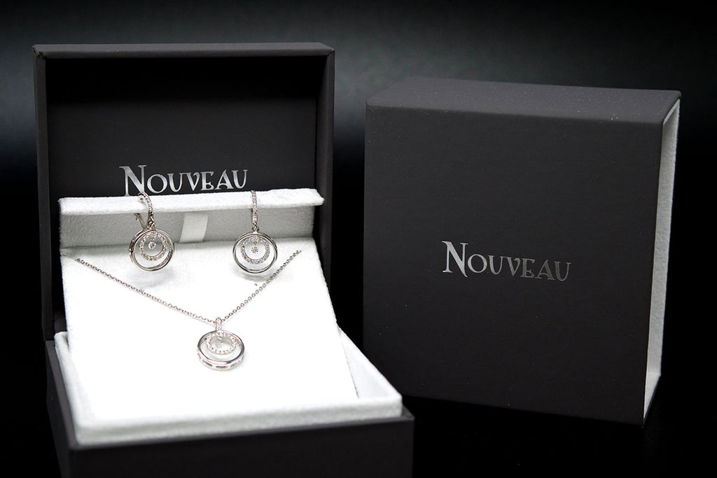 18ct White Gold Diamond Double Halo Earrings in a box, sold at Nouveau Jewellers in Manchester