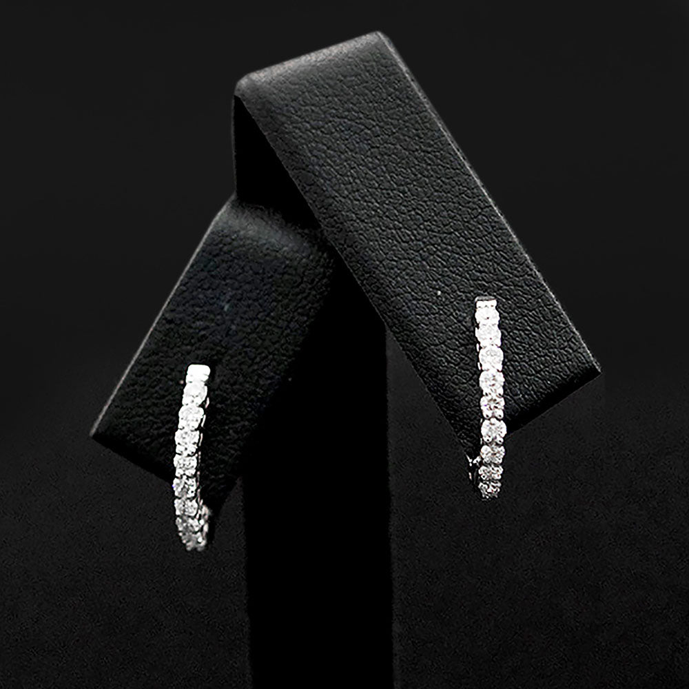 18ct White Gold Diamond Hoop Earrings close up, sold at Nouveau Jewellers in Manchester