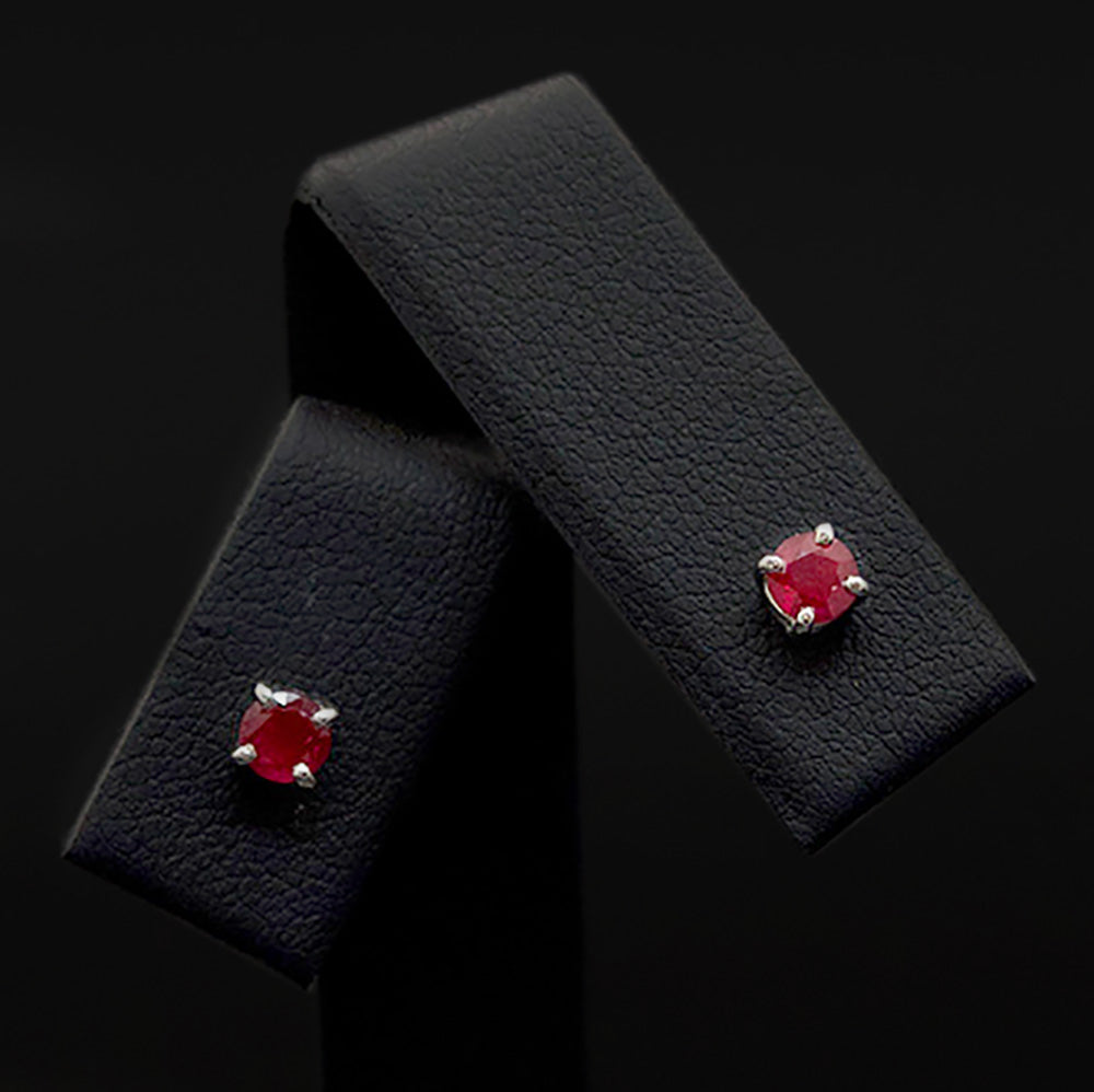 18ct White Gold Brilliant Ruby Stud Earrings Close Up, sold at Nouveau Jewellers in Manchester