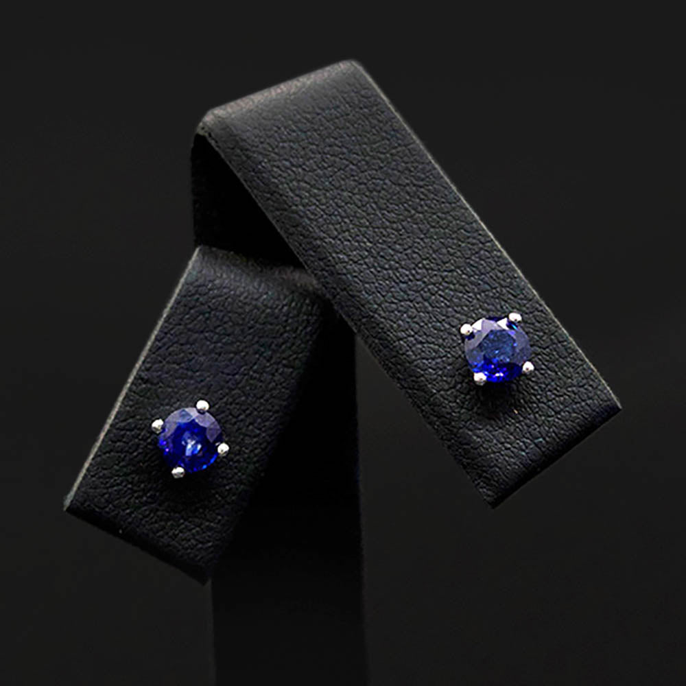 18ct White Gold Royal Blue Sapphire Stud Earrings close up, sold at Nouveau Jewellers in Manchester