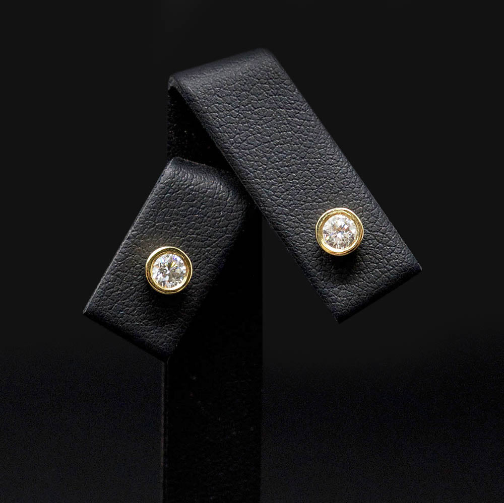 18ct Yellow Gold Sleek Diamond Stud Earrings close up, sold at Nouveau Jewellers in Manchester