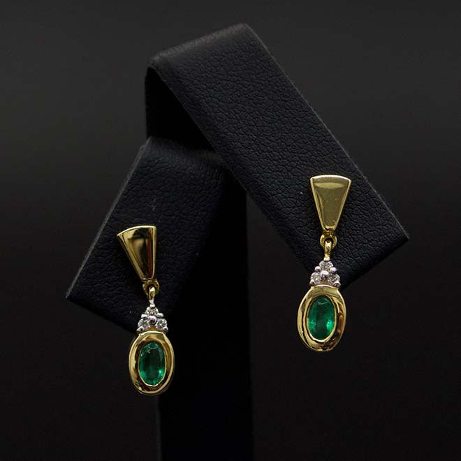 Gold, Emerald and Diamond Pendant Earrings Close Up, sold at Nouveau Jewellers in Manchester