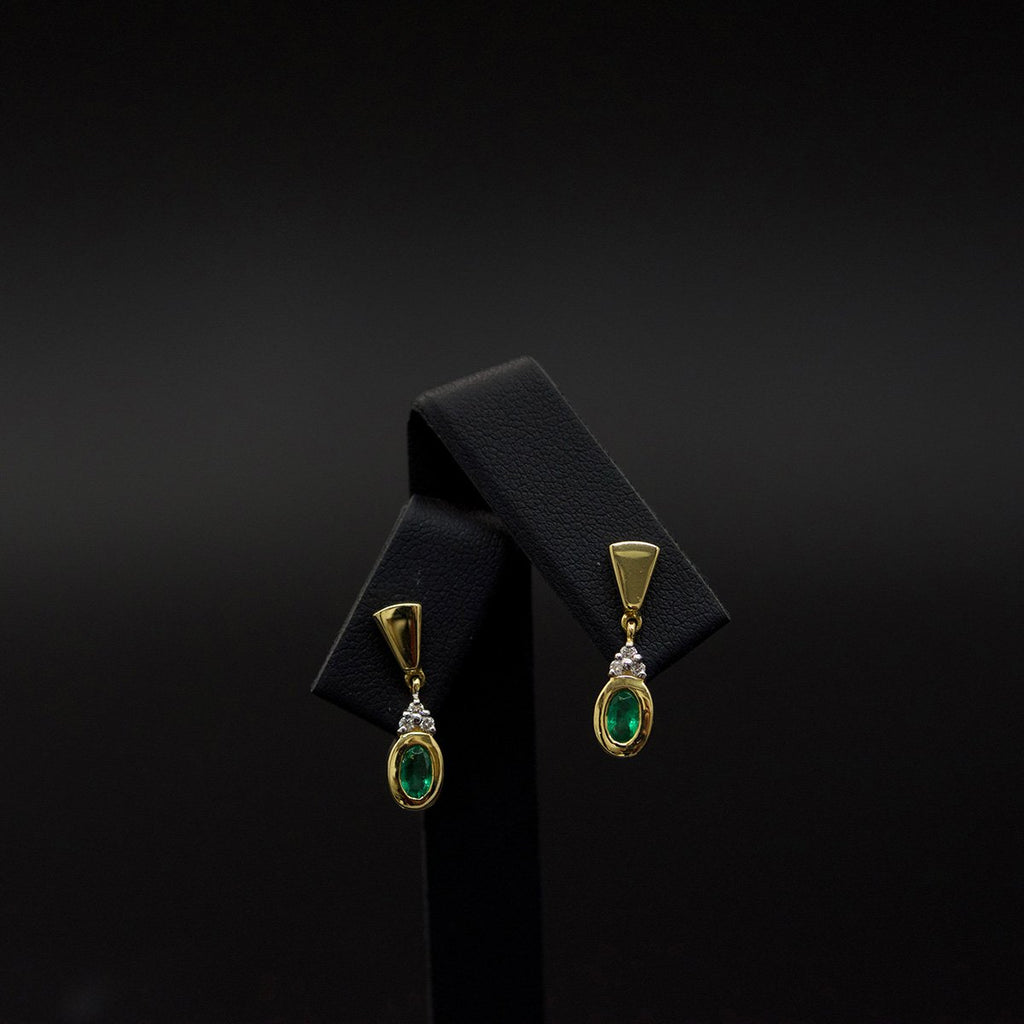 Gold, Emerald and Diamond Pendant Earrings, sold at Nouveau Jewellers in Manchester