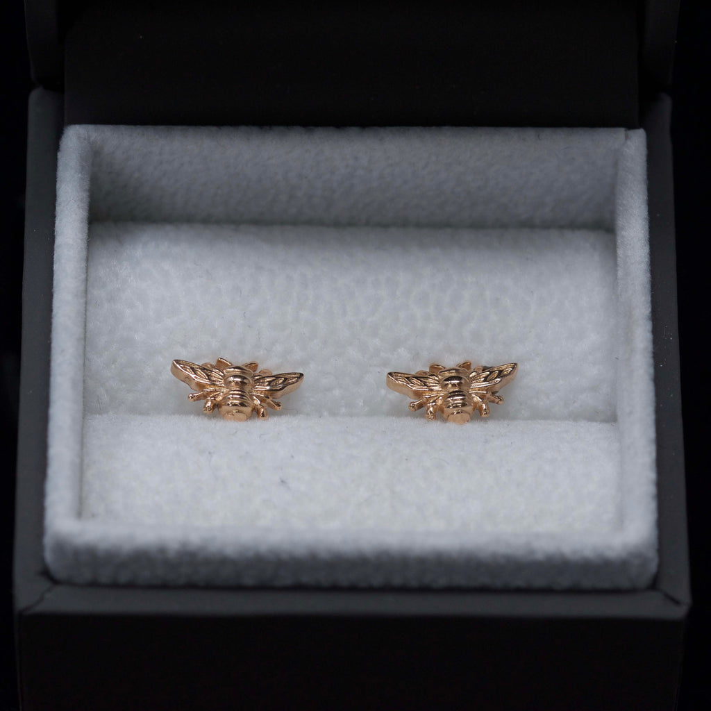 Rose Gold Manchester Bee Studs close up in box, Beehive Collection exclusively sold at Nouveau Jewellers in Manchester